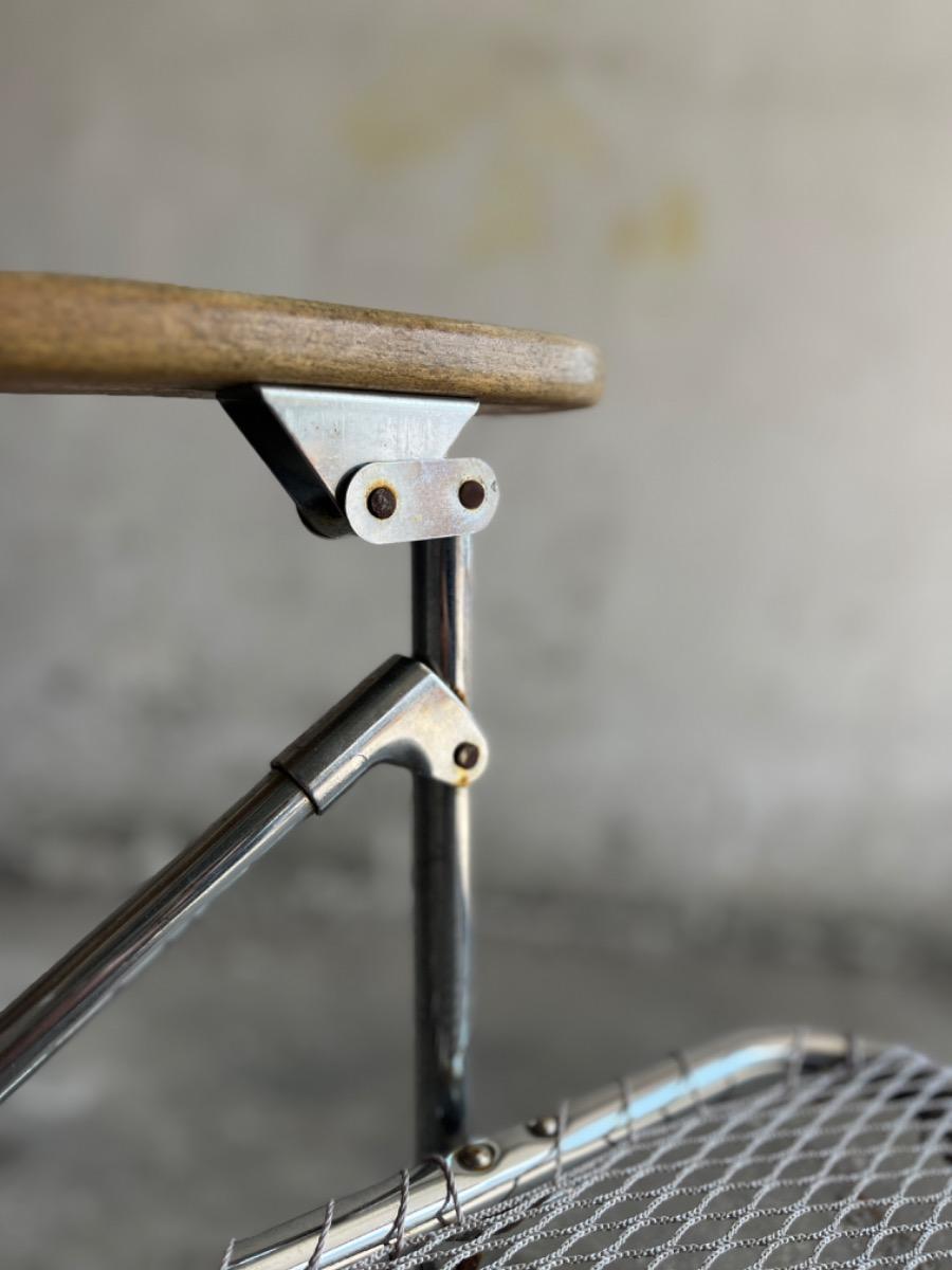 Set of two vintage folding chairs with wire frame in aluminum