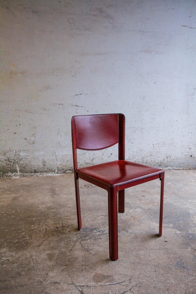 Set of 6 red leather chairs by Matteo Grassi