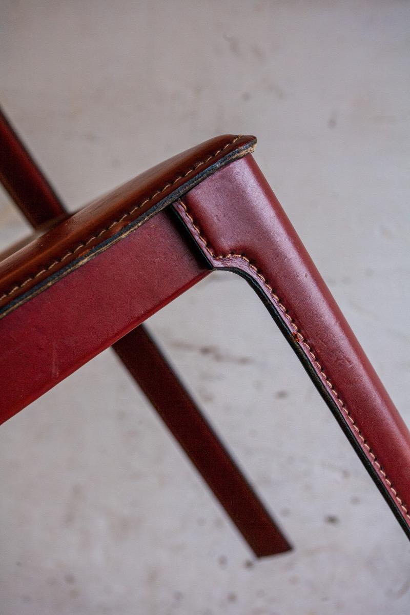 Set of 6 red leather chairs by Matteo Grassi
