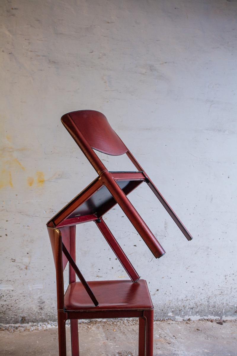 Set of 6 red leather chairs by Matteo Grassi