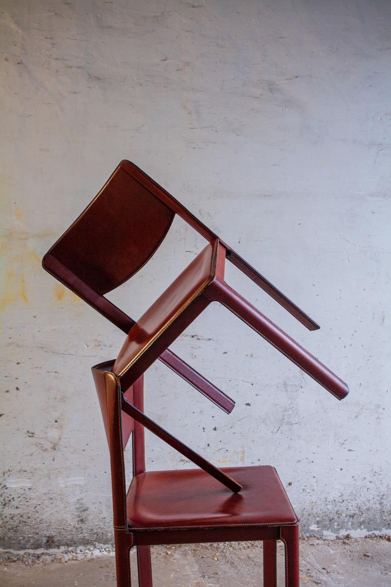 Set of 6 red leather chairs by Matteo Grassi