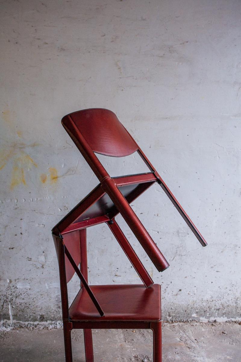 Set of 6 red leather chairs by Matteo Grassi