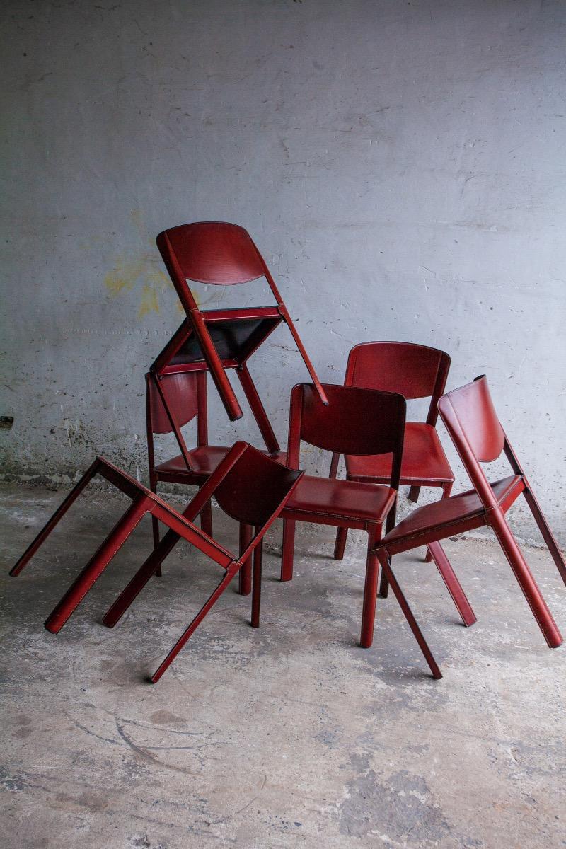 Set of 6 red leather chairs by Matteo Grassi