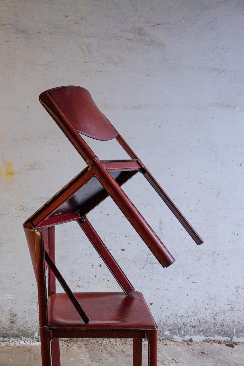 Set of 6 red leather chairs by Matteo Grassi