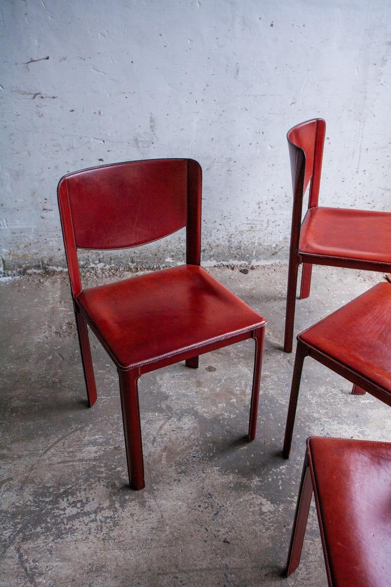 Set of 6 red leather chairs by Matteo Grassi
