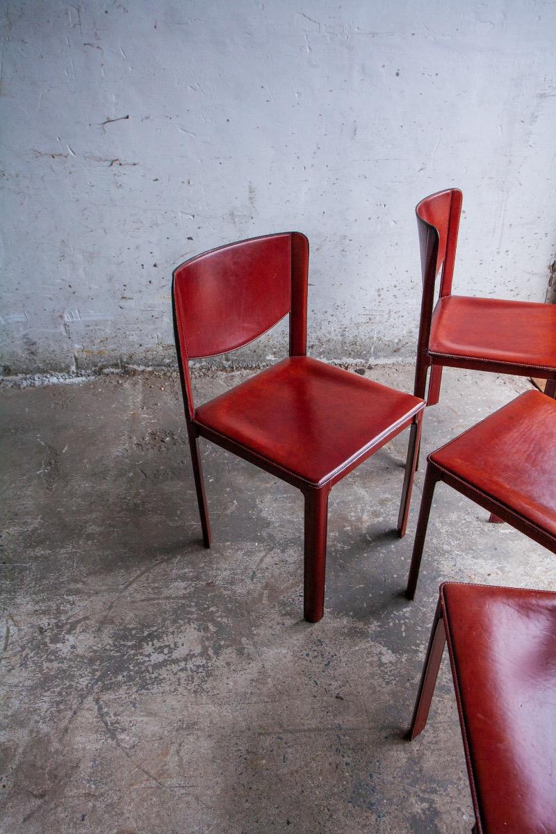 Set of 6 red leather chairs by Matteo Grassi