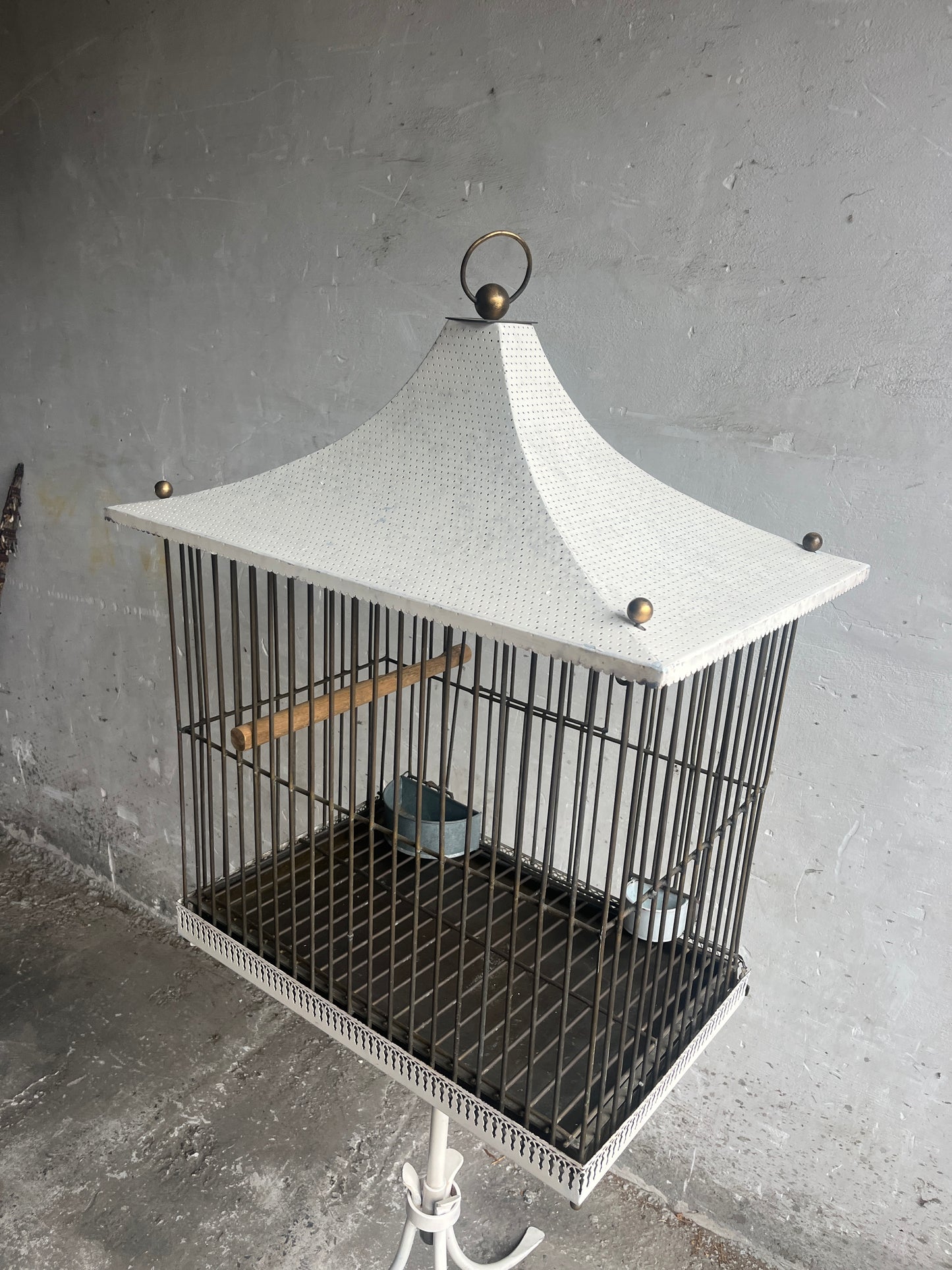 Pagoda-style vintage bird cage on stand