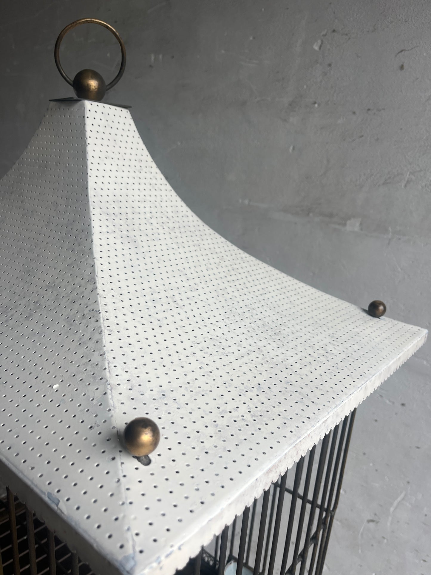 Pagoda-style vintage bird cage on stand