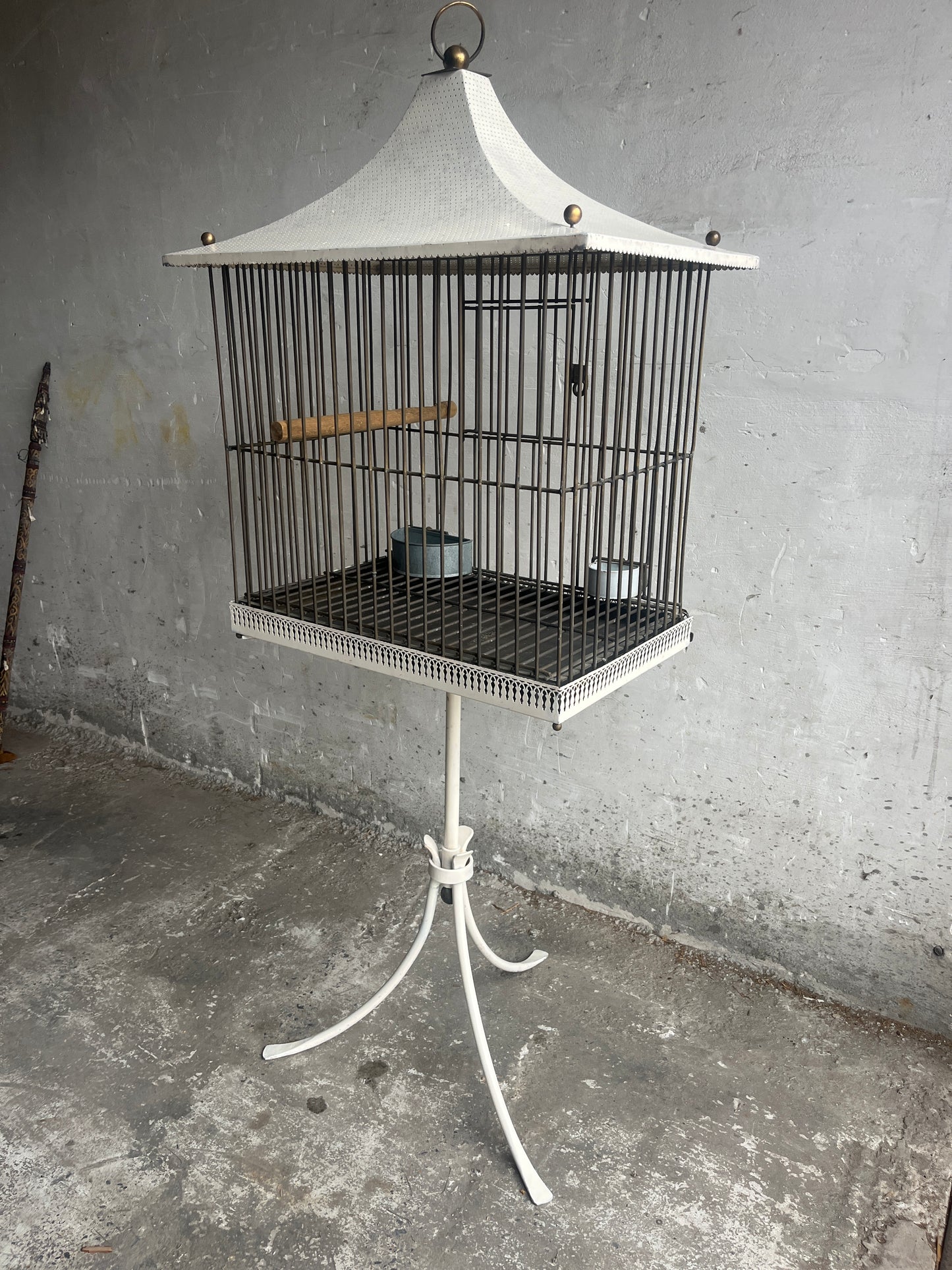 Pagoda-style vintage bird cage on stand