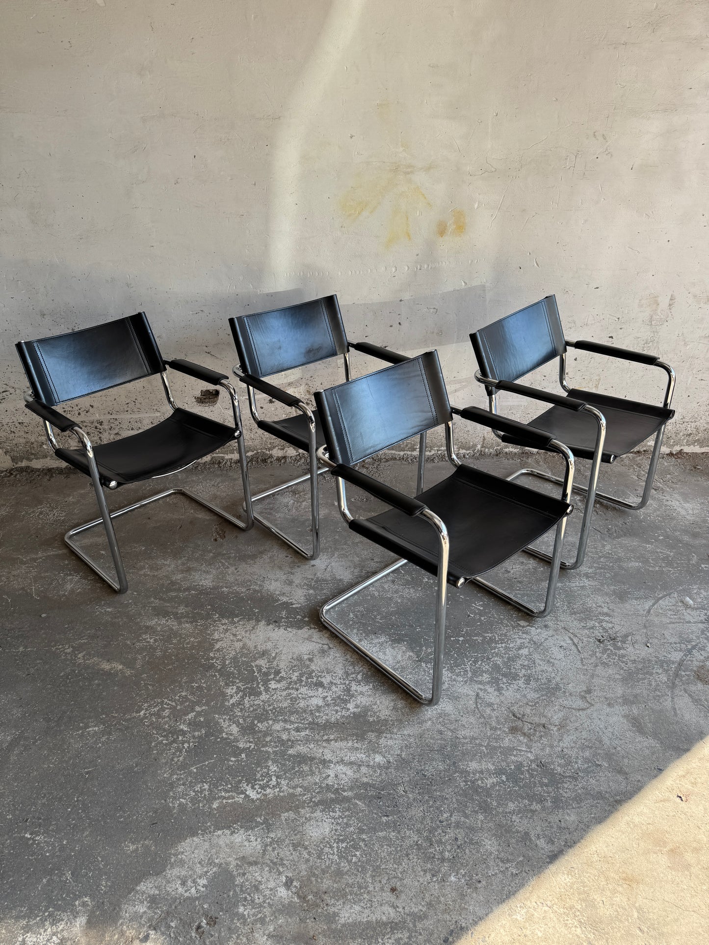 Set of 4 Matteo Grassi chairs in black leather