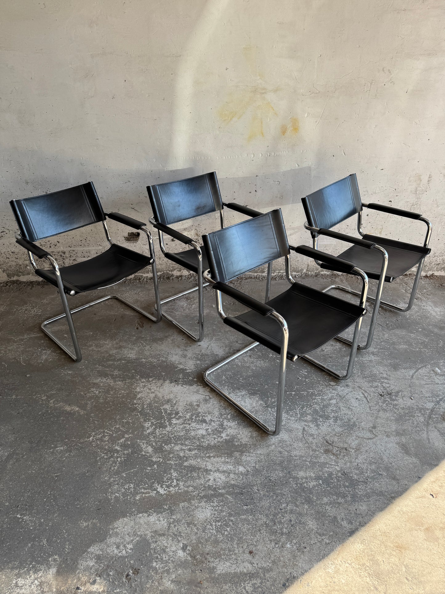 Set of 4 Matteo Grassi chairs in black leather