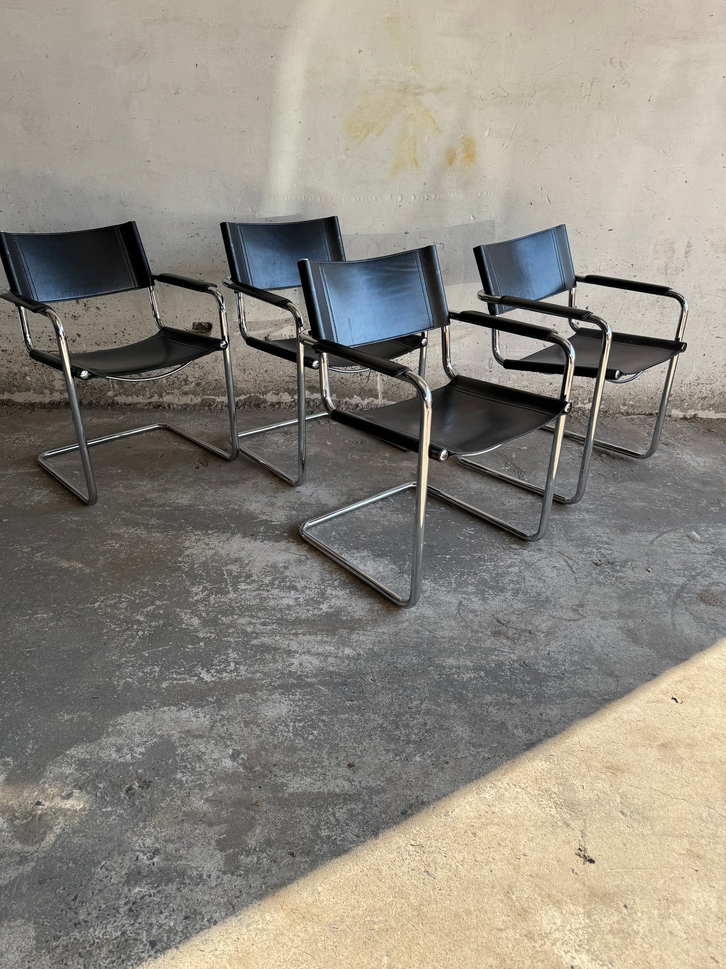 Set of 4 Matteo Grassi chairs in black leather