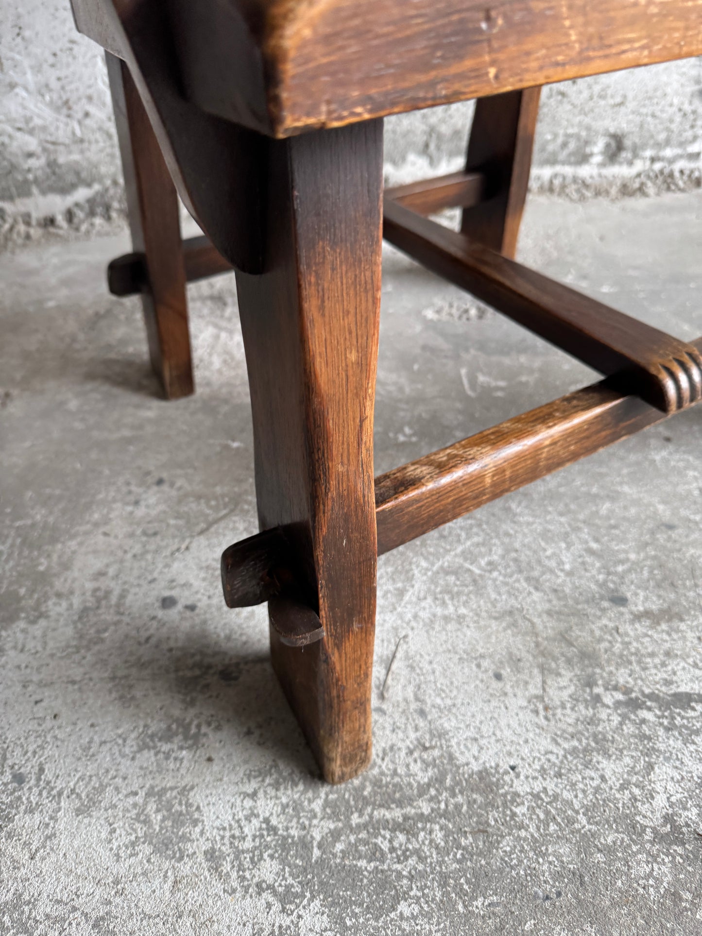 Brutalist armchair with rattan seat and leather back