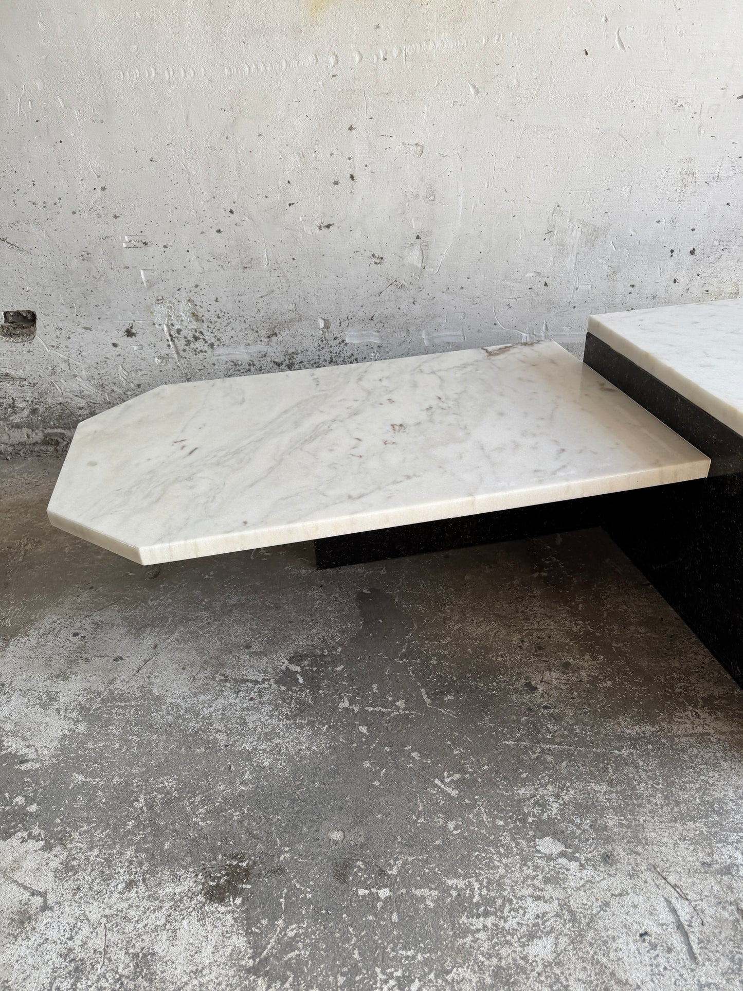 Unique postmodern coffee table in marble and granite