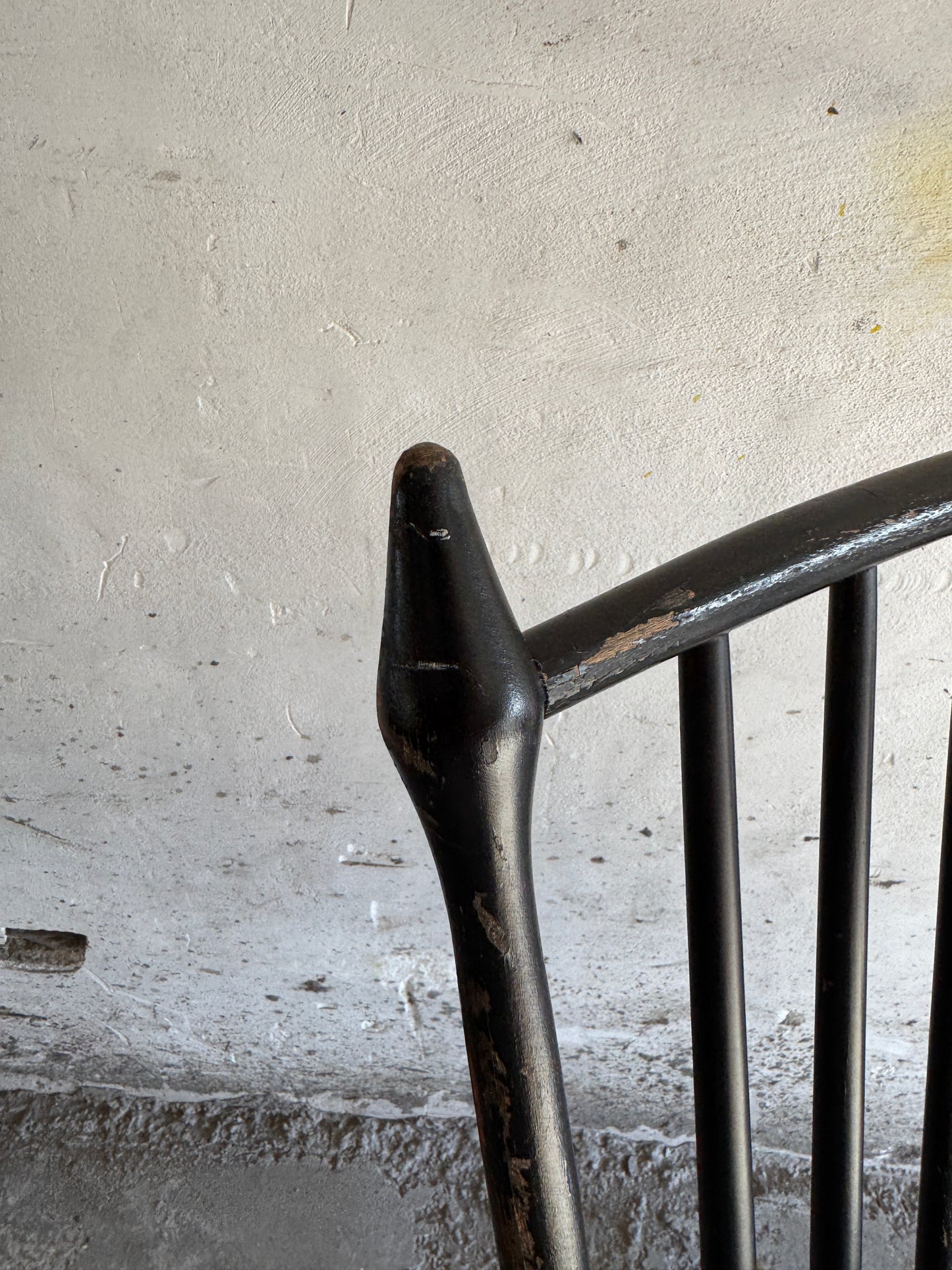 Black Scandinavian rocking chair in Windsor style