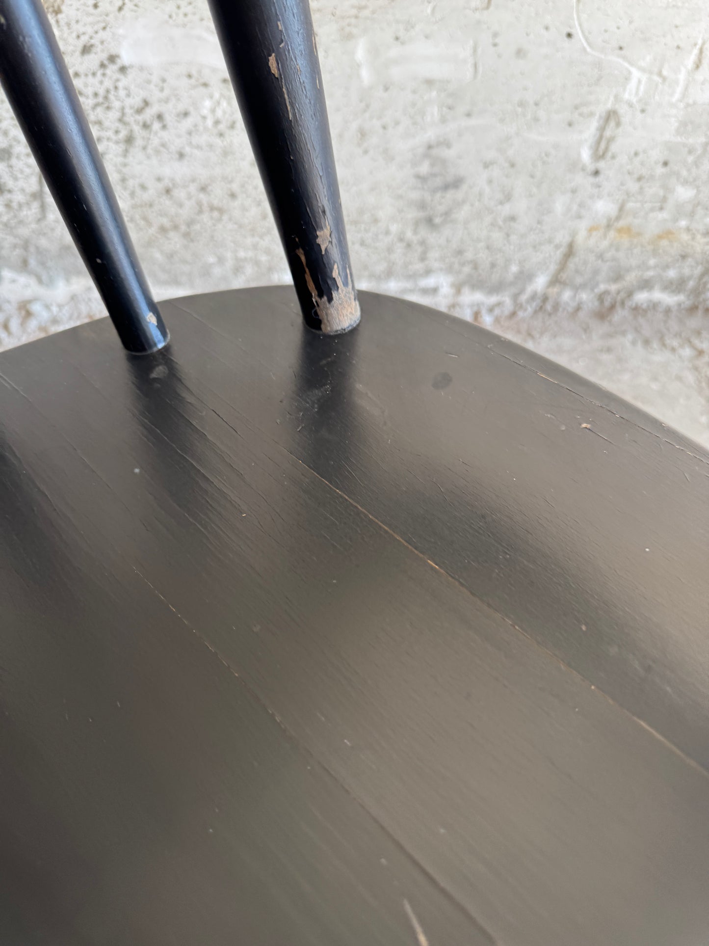Black Scandinavian rocking chair in Windsor style