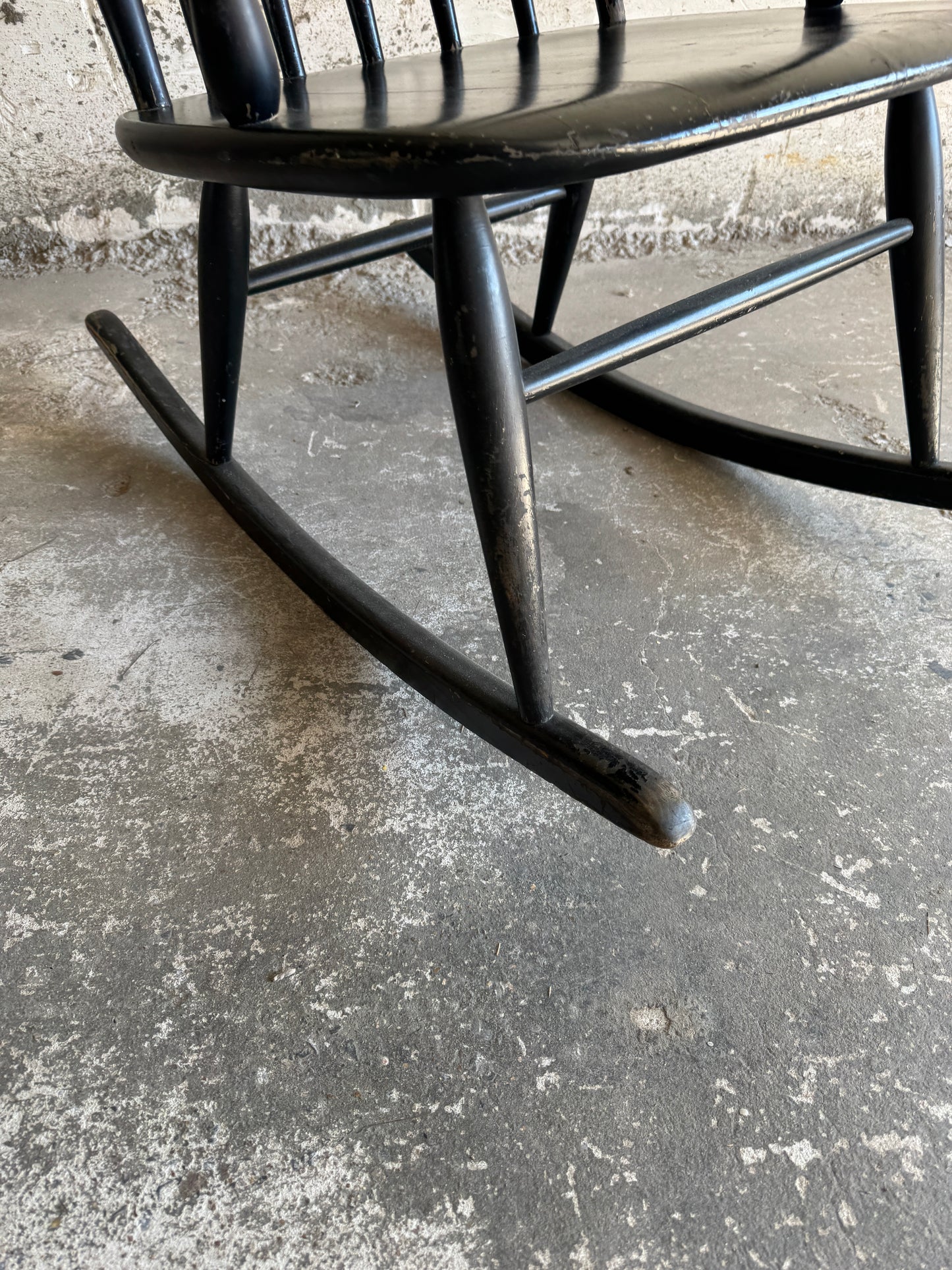 Black Scandinavian rocking chair in Windsor style