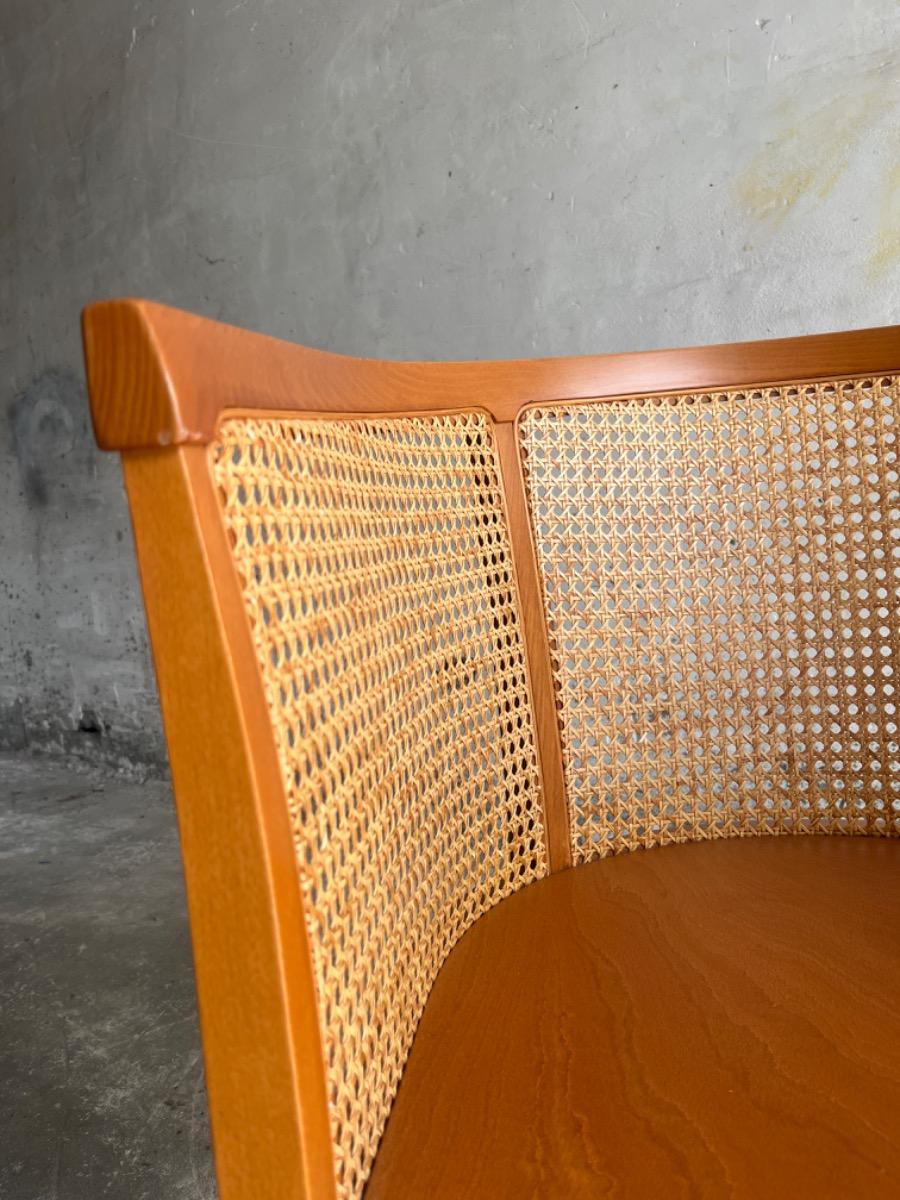 mid-century armstoel in hout en rotan (7stuks beschikbaar)