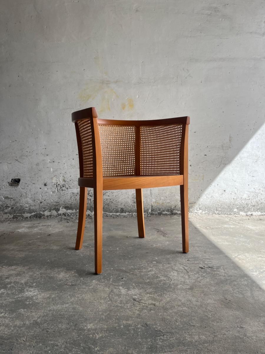 mid-century armstoel in hout en rotan (7stuks beschikbaar)