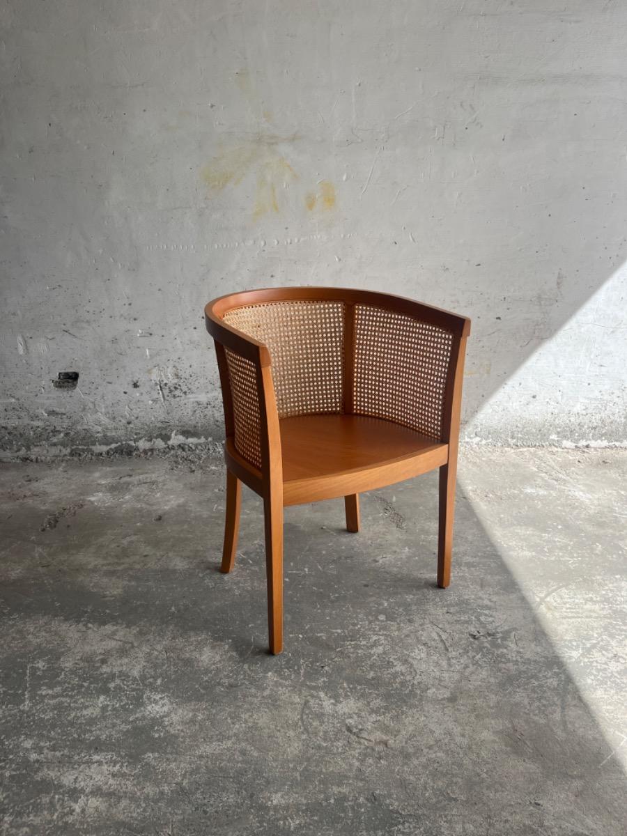 mid-century armstoel in hout en rotan (7stuks beschikbaar)