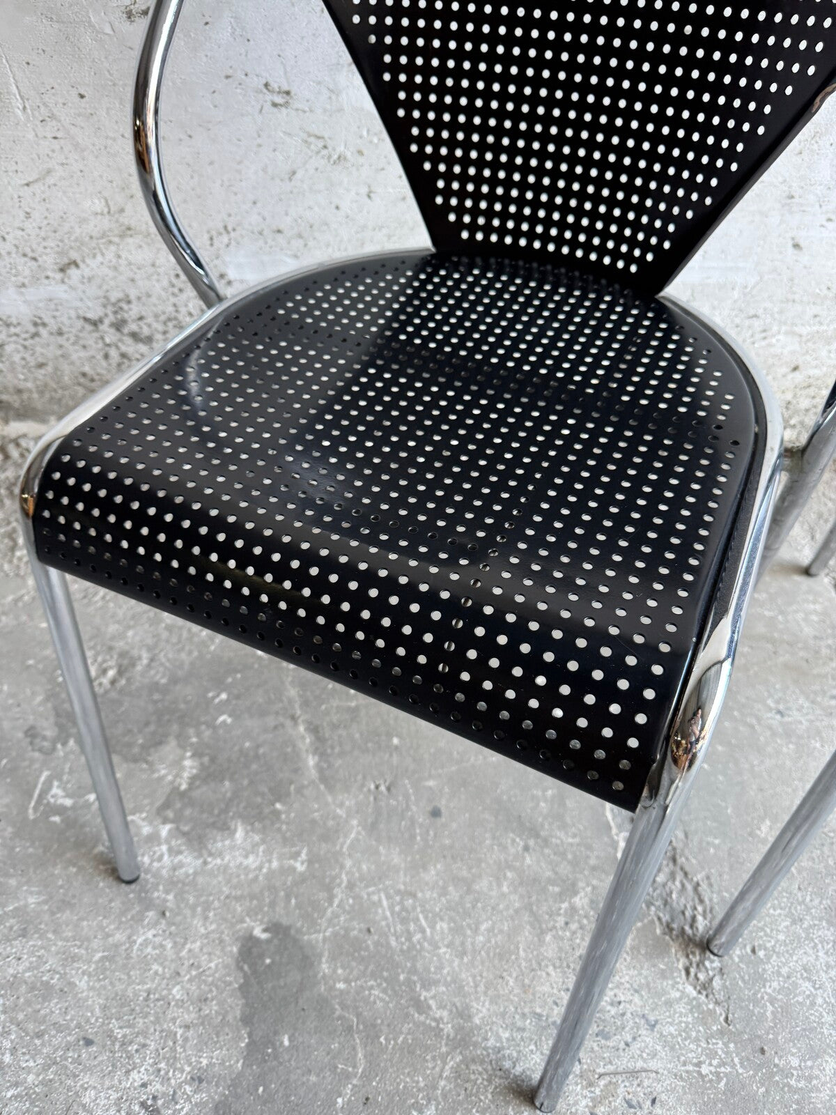 Set of 2 metal chairs with perforated design (1980s)