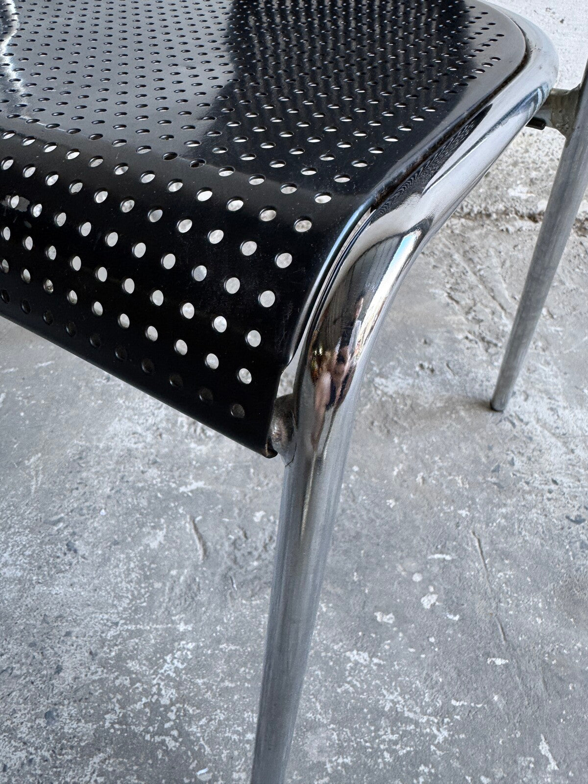 Set of 2 metal chairs with perforated design (1980s)