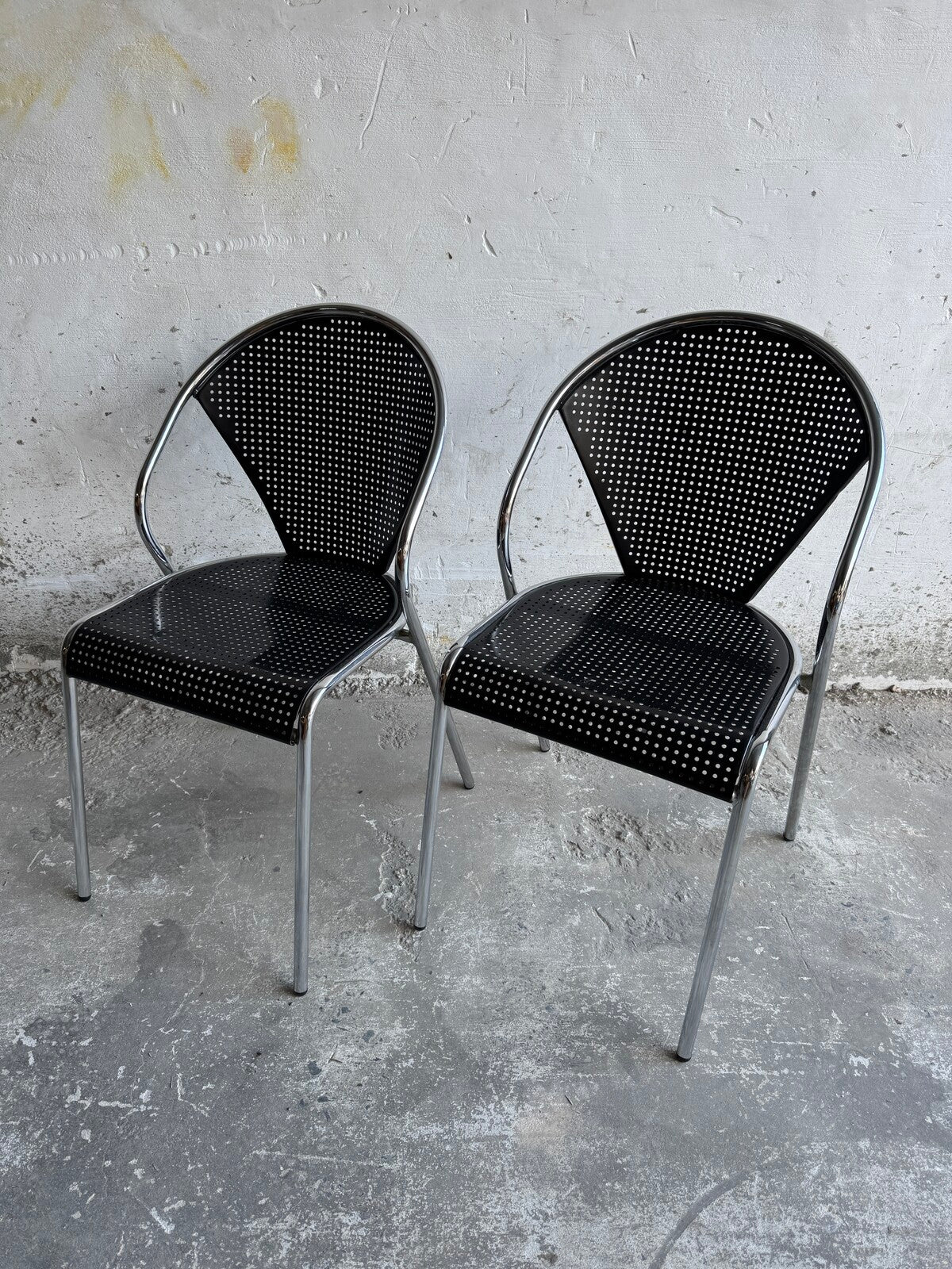 Set of 2 metal chairs with perforated design (1980s)