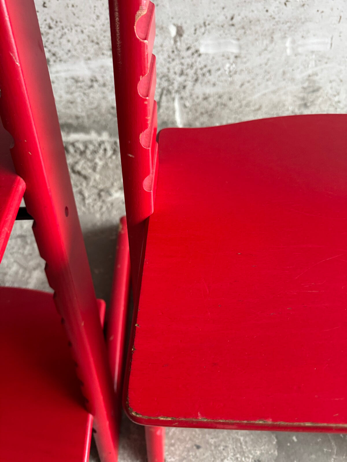 Set of 2 red children's chairs in adjustable school style (1990s)
