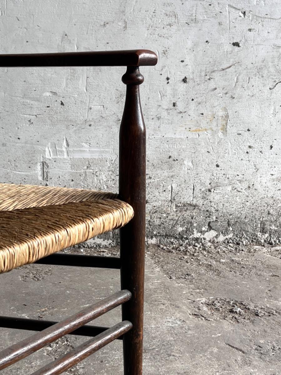 Vintage Arts & Crafts armchair with rush seat