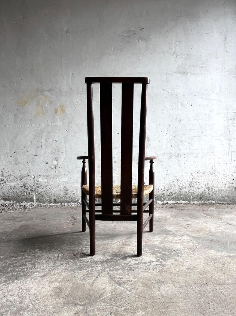 Vintage Arts & Crafts armchair with rush seat