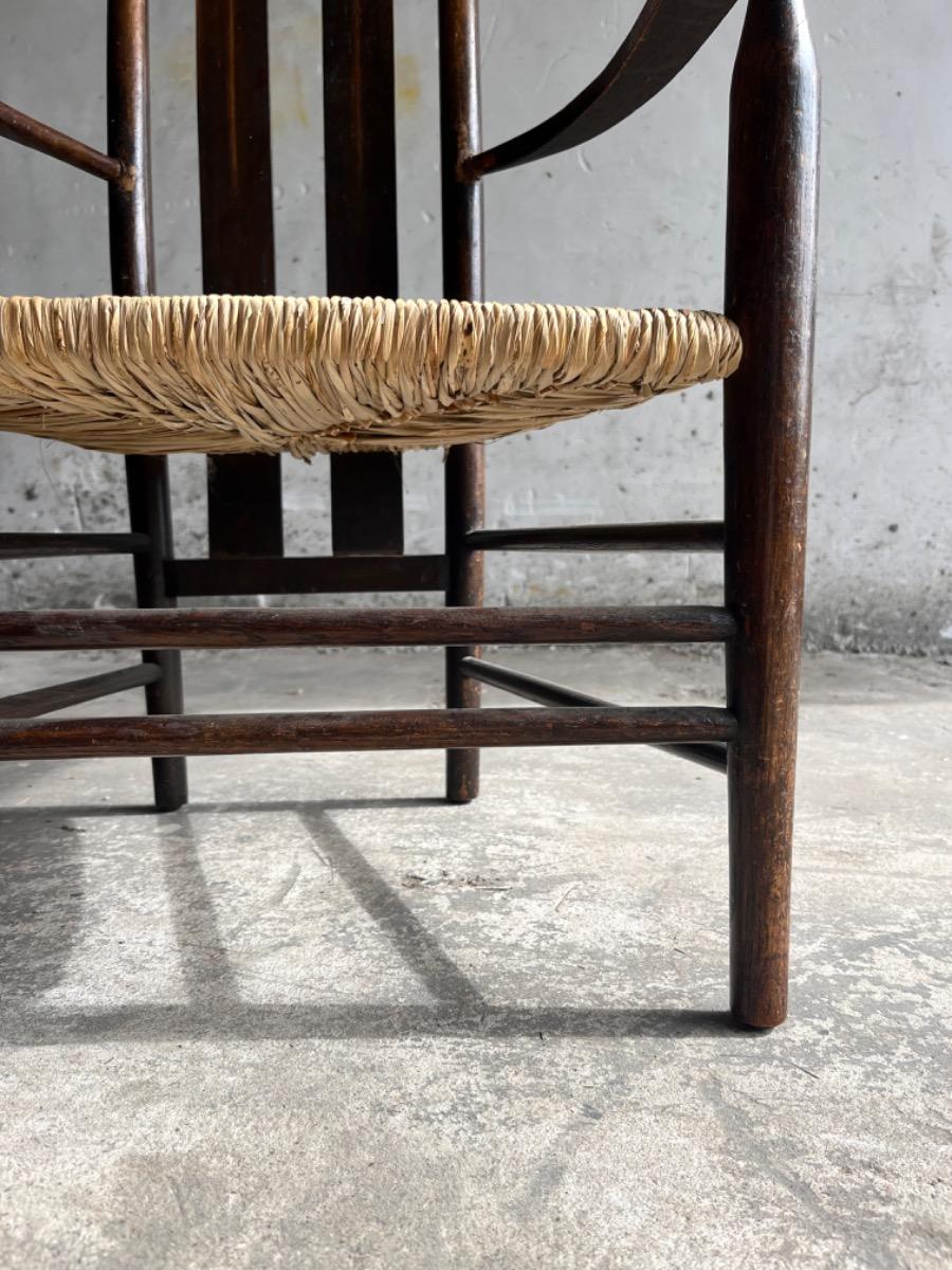 Vintage Arts & Crafts armchair with rush seat