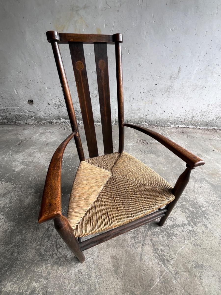 Vintage Arts & Crafts armchair with rush seat