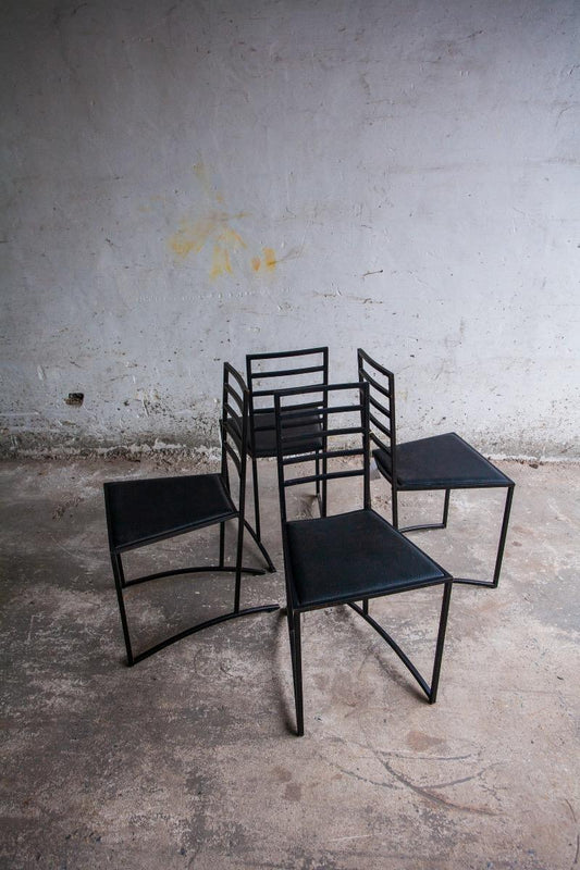 Set van 4 minimalistische eetkamerstoelen in zwart staal