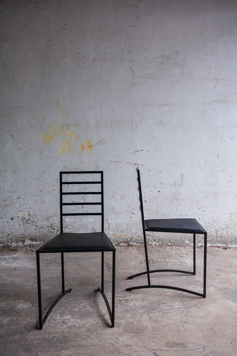 Set van 4 minimalistische eetkamerstoelen in zwart staal