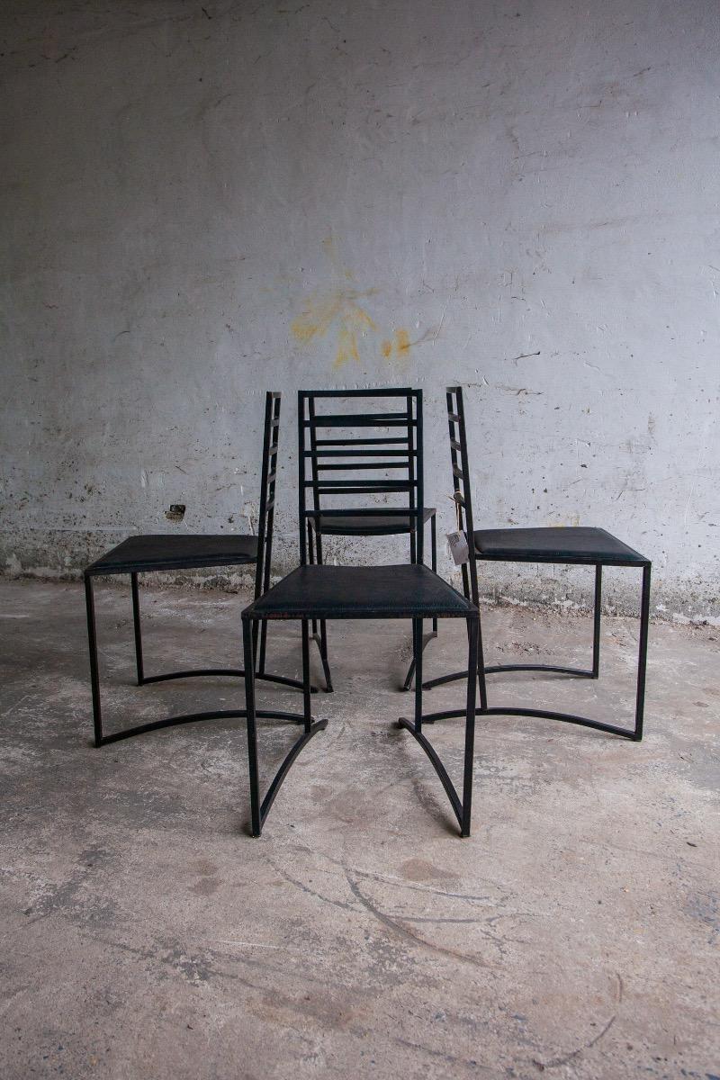Set van 4 minimalistische eetkamerstoelen in zwart staal