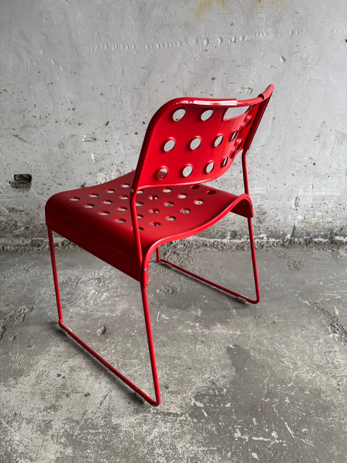 Red Omstak chair by Rodney Kinsman for Bieffeplast (1980)