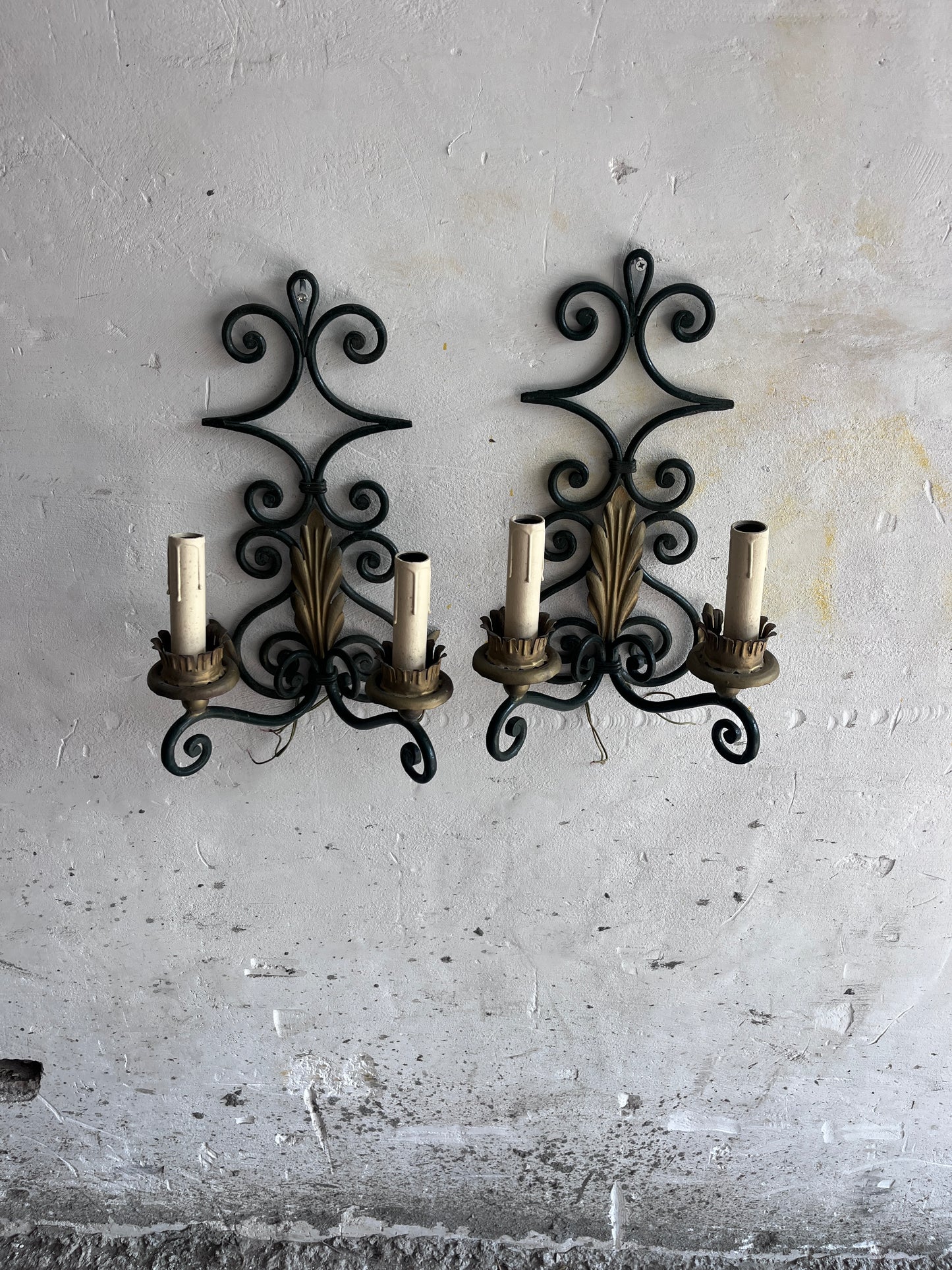 Pair of Wrought Iron Wall Sconces with Gilt Leaf Motifs
