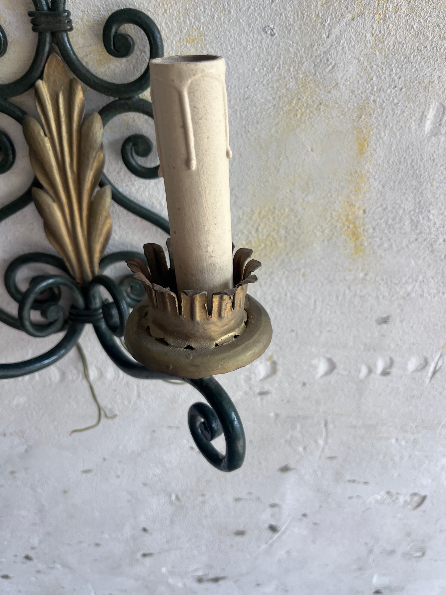 Pair of Wrought Iron Wall Sconces with Gilt Leaf Motifs