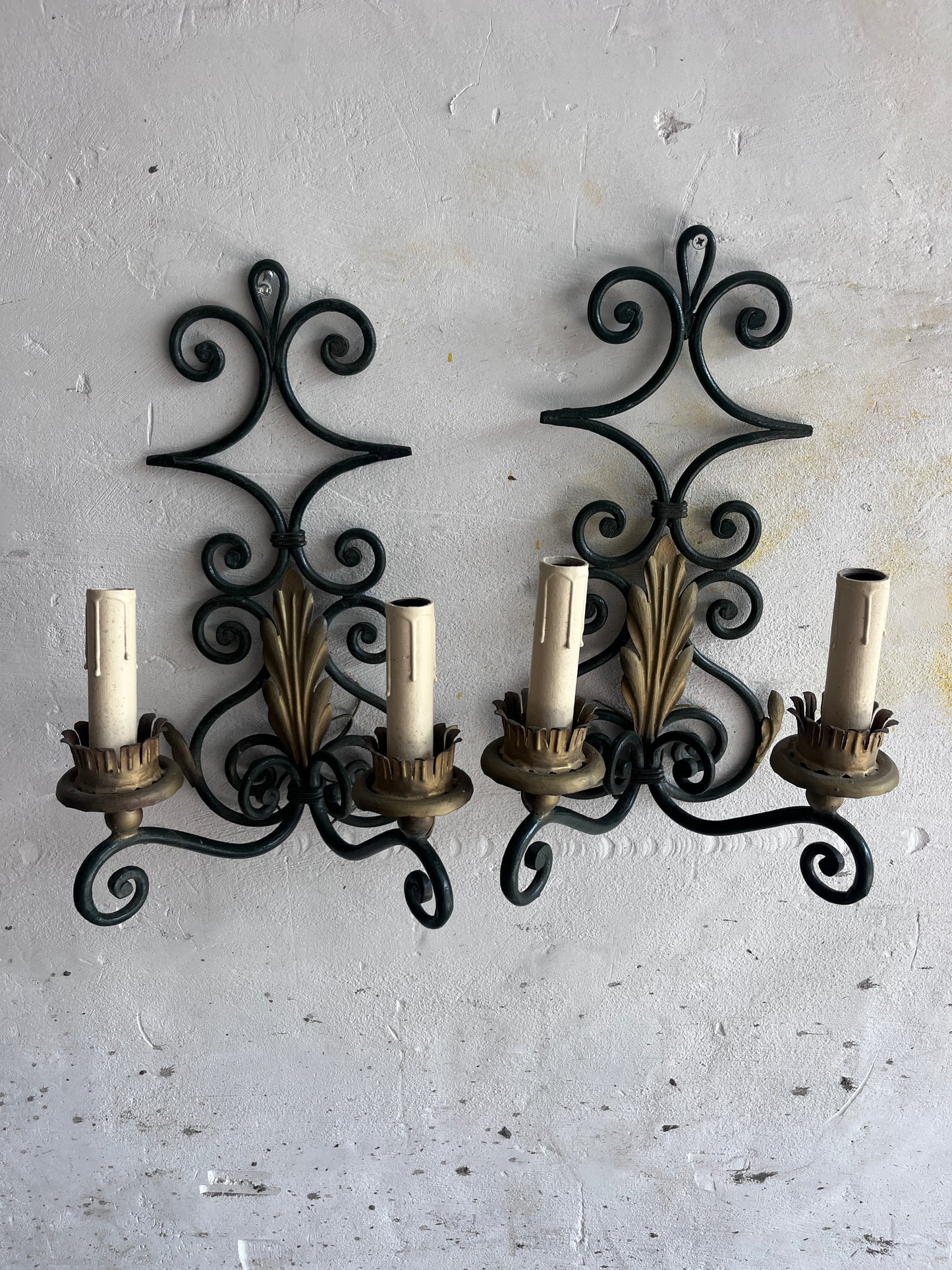Pair of Wrought Iron Wall Sconces with Gilt Leaf Motifs