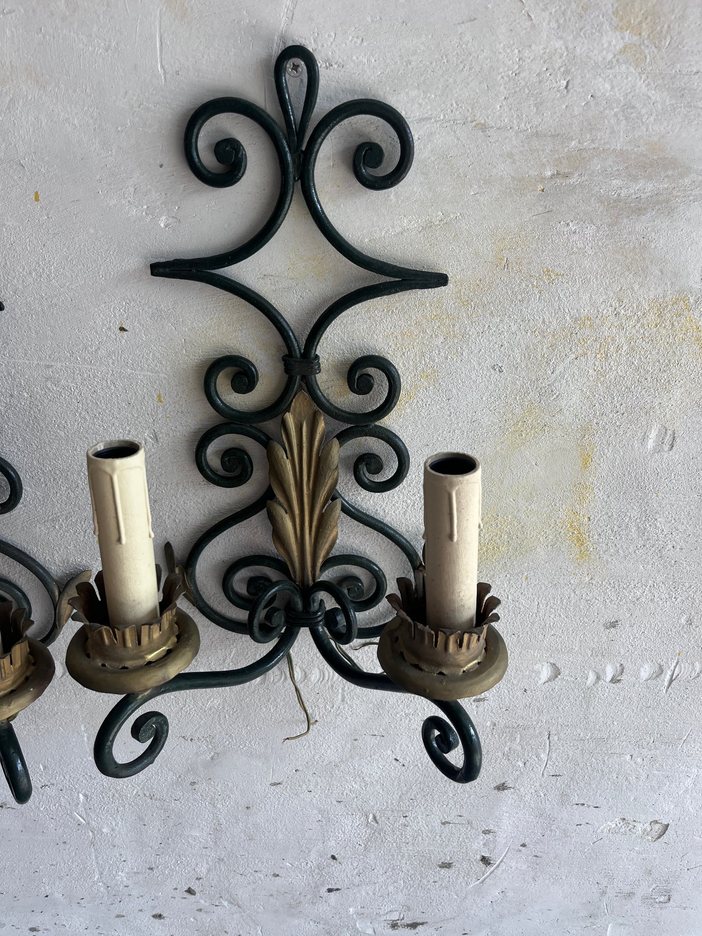 Pair of Wrought Iron Wall Sconces with Gilt Leaf Motifs