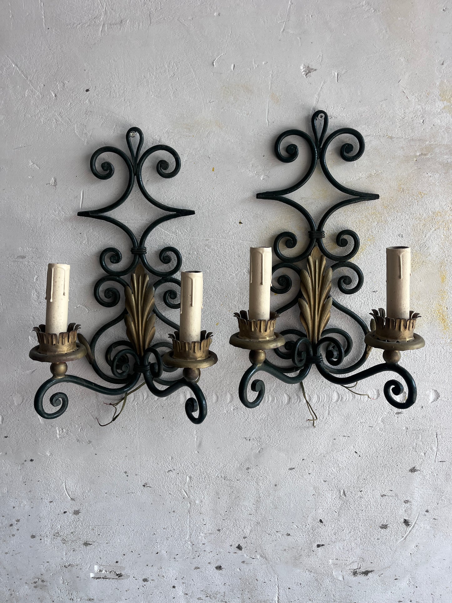 Pair of Wrought Iron Wall Sconces with Gilt Leaf Motifs
