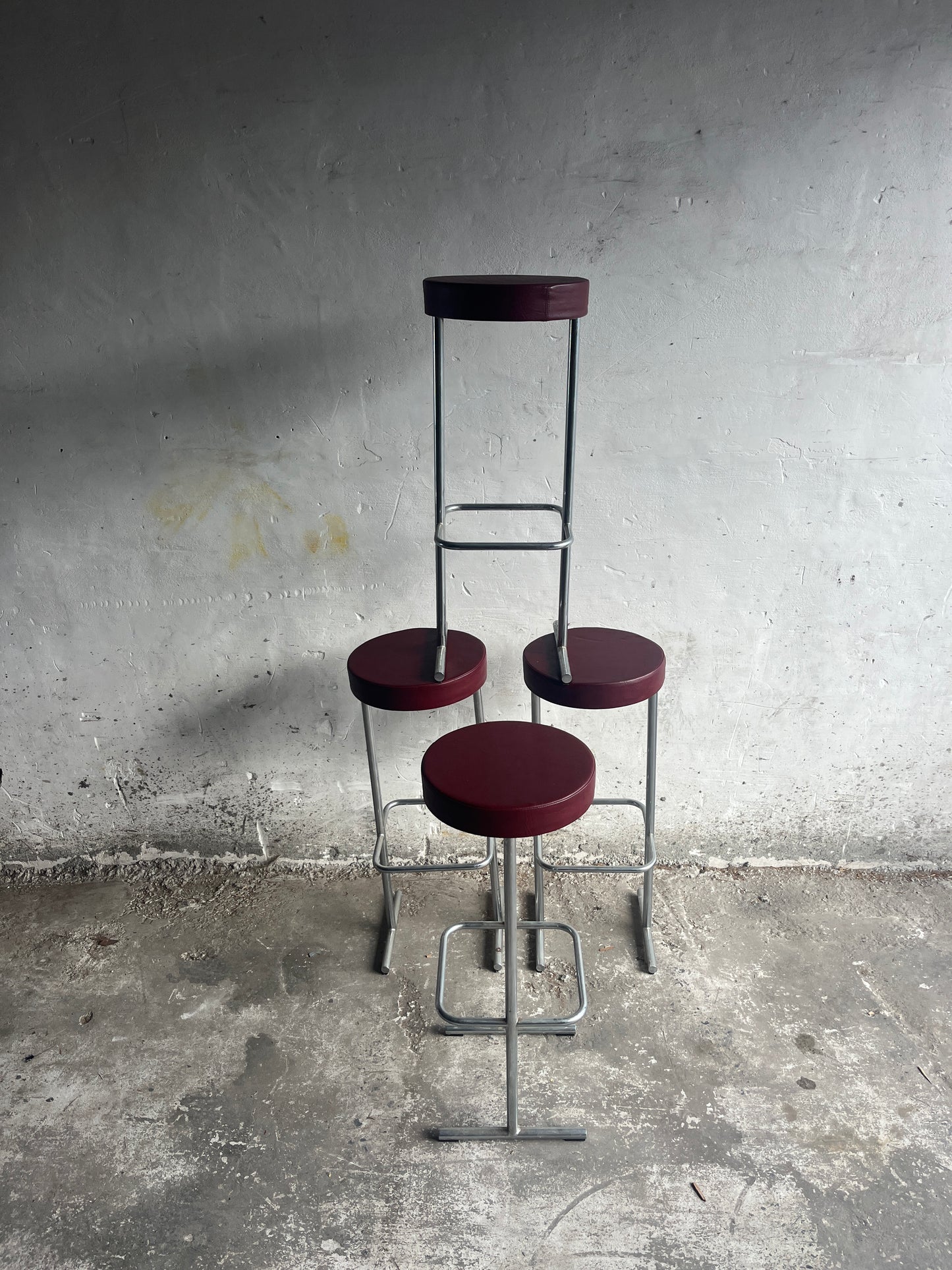 Set of 4 Industrial Bar Stools – Burgundy Seats (1980s)