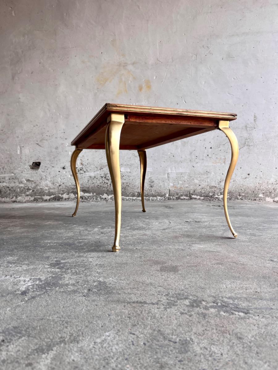 Vintage salontafel met vergulde poten en geometrisch ingelegd blad