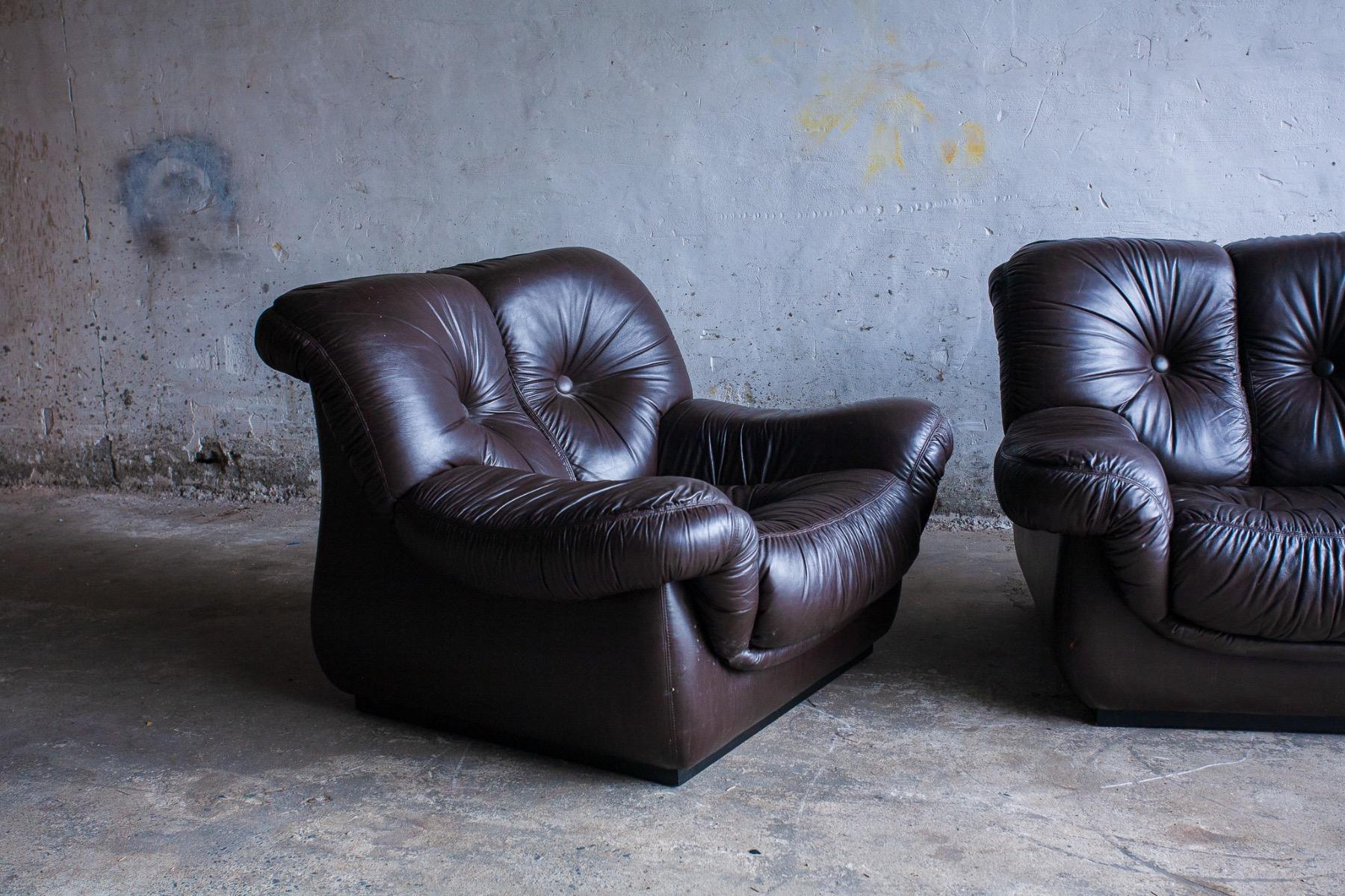 2 Midcentury leather club chairs 