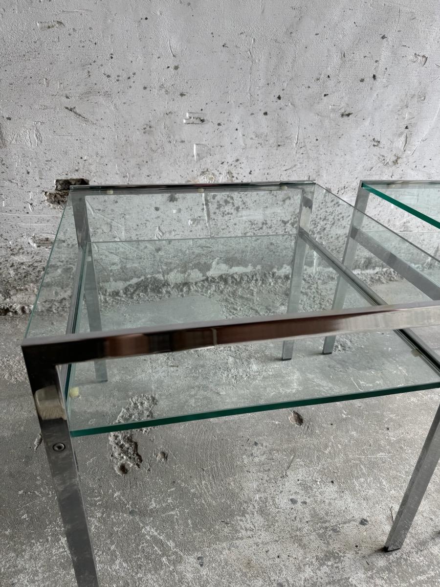 pair of coffee tables in chrome steel and glass - 1970s