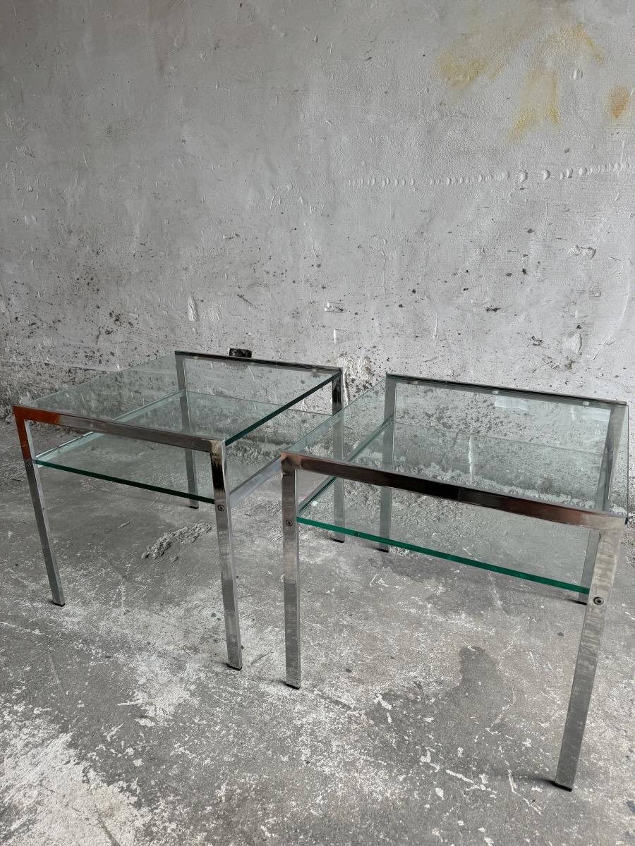 pair of coffee tables in chrome steel and glass - 1970s