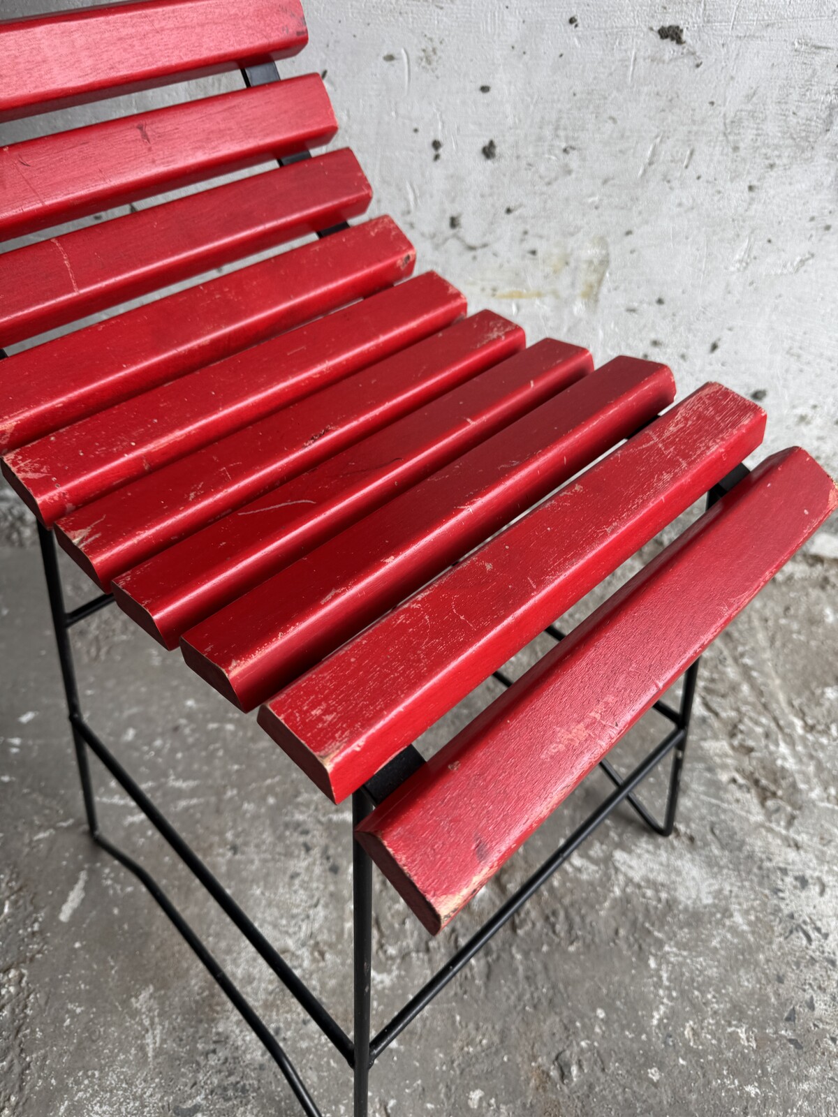 Red Slatted Chair with Black Metal Frame