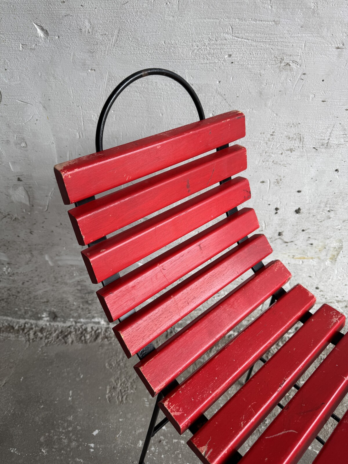 Red Slatted Chair with Black Metal Frame