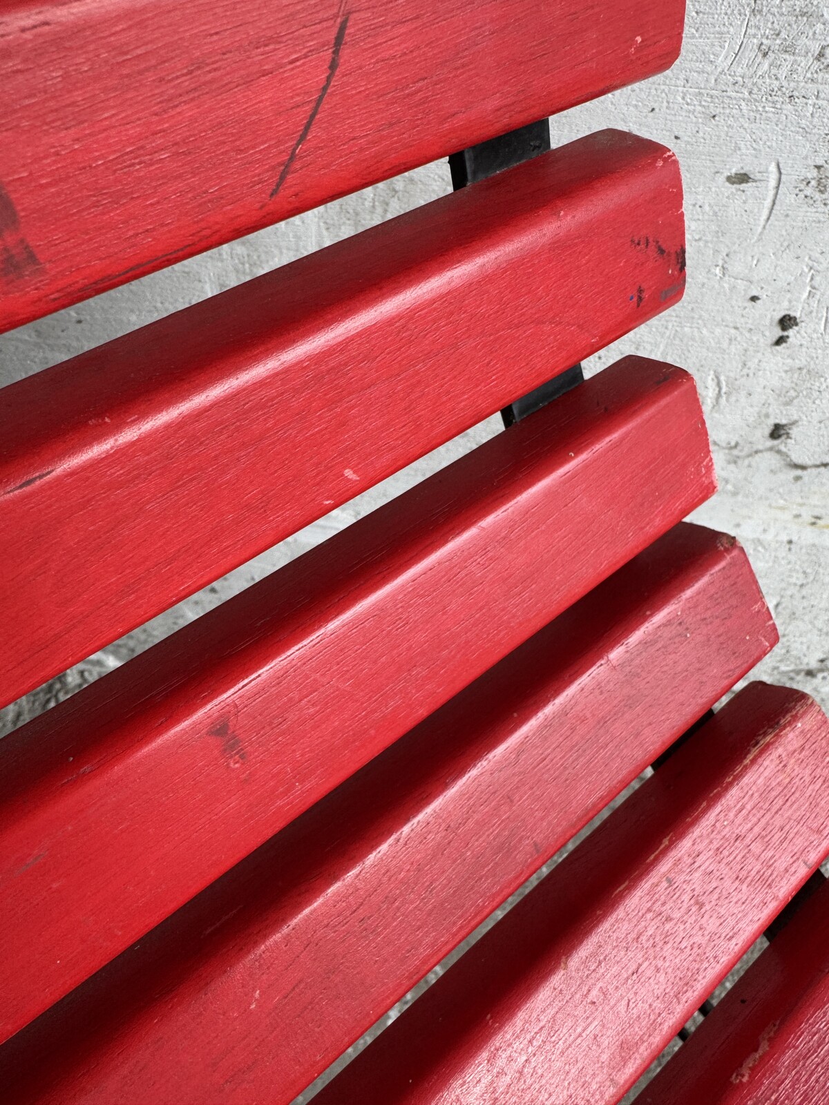 Red Slatted Chair with Black Metal Frame