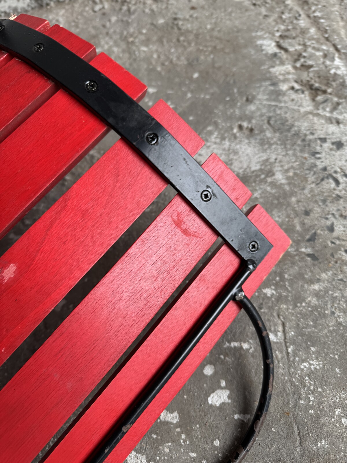 Red Slatted Chair with Black Metal Frame